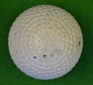 Scarce M & T (Miller and Taylor) The Elf bramble pattern rubber core golf ball – retaining 90% white