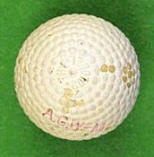 The Colonel bramble pattern guttie golf ball – retaining 90% of the original white finish and