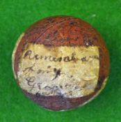 Extremely rare small red painted smooth gutty ball c. 1860 – with three paper labels with hand
