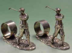 Pair of fine golfing table knap kin rings – each ring mounted on an oval naturalistic base and Vic