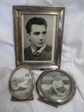 Three GV silver photograph frames. Largest 6.75 x 5.25 ins.