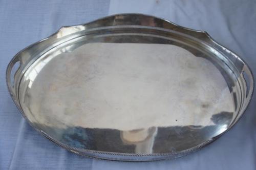 Edwardian oval silver plated on copper galleried tea tray.