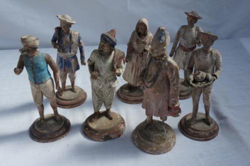 Collection of twelve 19thC Indian cold-painted terracotta figures - The Gardener, Cook, Clerk, Fruit