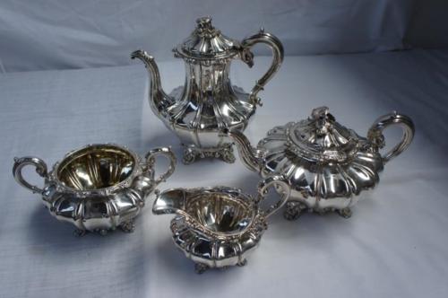 Good WIV fluted silver tea/coffee service with floral finials, pie-crust border, scroll handles,
