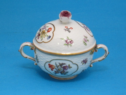 A Dresden porcelain two-handled cup and cover, decorated with panels of flower, rose bud handle,