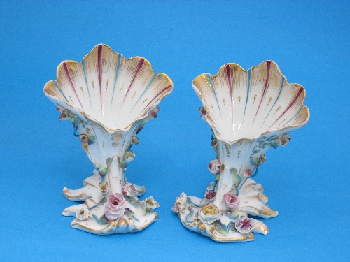 A pair of Dresden porcelain cornucopia shaped vases, with pink and gilt decoration, 16cm.