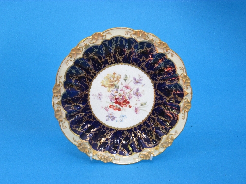 A set of ten Hammersley cabinet plates, with floral centres and blue gilt borders, 22cm.