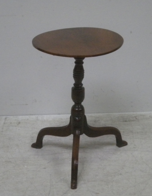A mahogany tripod table, with circular tilt top, on turned baluster stem, (af), 34cm.