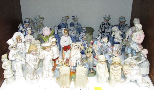 SECTION 2. A large collection of Dresden and other porcelain figures, of children and couples in