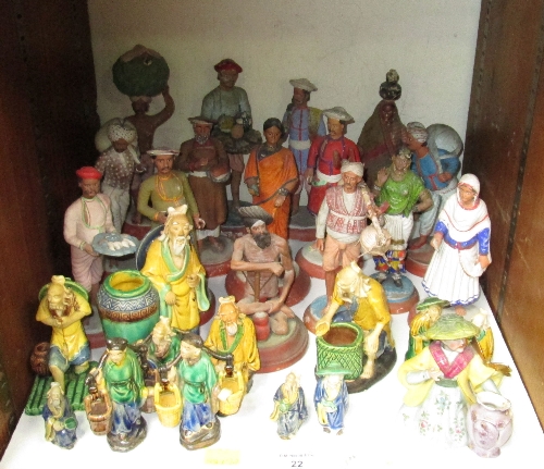 SECTION 22. A collection of Indian painted clay figures, on circular bases, and Chinese glazed