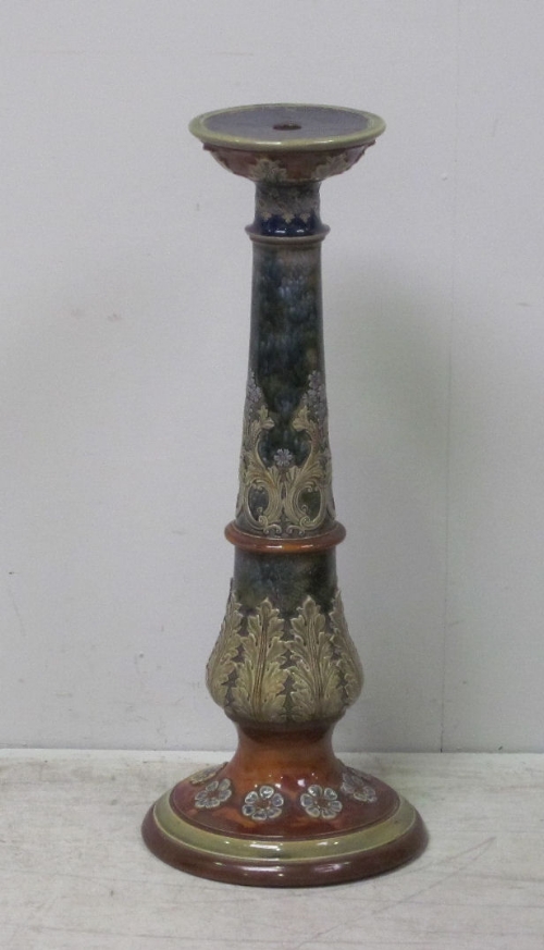 A Royal Doulton stoneware jardiniere stand, baluster shape with mottled blue glaze, decorated with