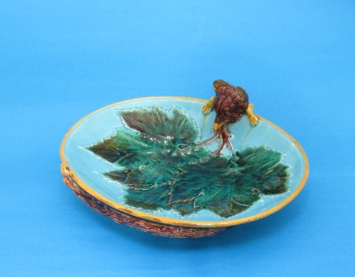 A George Jones Victorian Majolica dish, oval shape with fox head and tail handle, moulded leaf