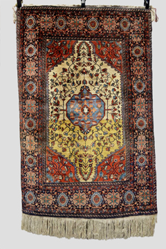 Saruk rug, north west Persia, mid-20th century, 4ft. 10in. x 3ft. 2in. 1.47m. x 0.97m. Reweave to