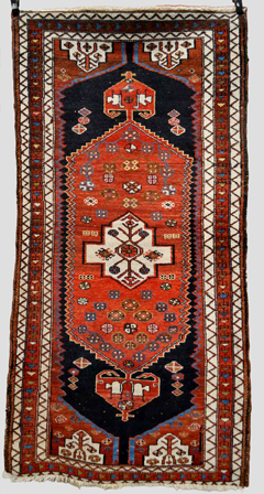 Kurdish rug, north west Persia, early 20th century, 6ft. 7in. x 3ft. 4in. 2.01m. x 1.02m.