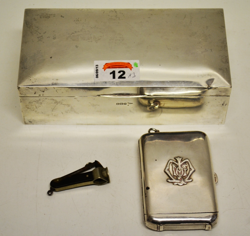 A late Victorian silver combined cigarette and vesta case, gilded inside and applied a monogram.