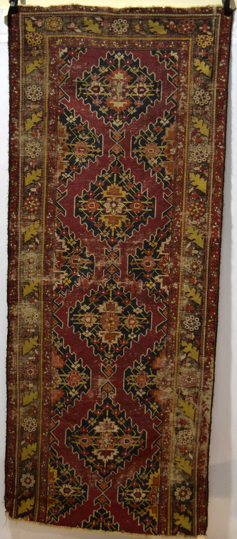 Fragment of a Karabakh runner, south west Caucasus, early 20th century, 8ft. 5in. x 3ft. 6in. 2.56m.