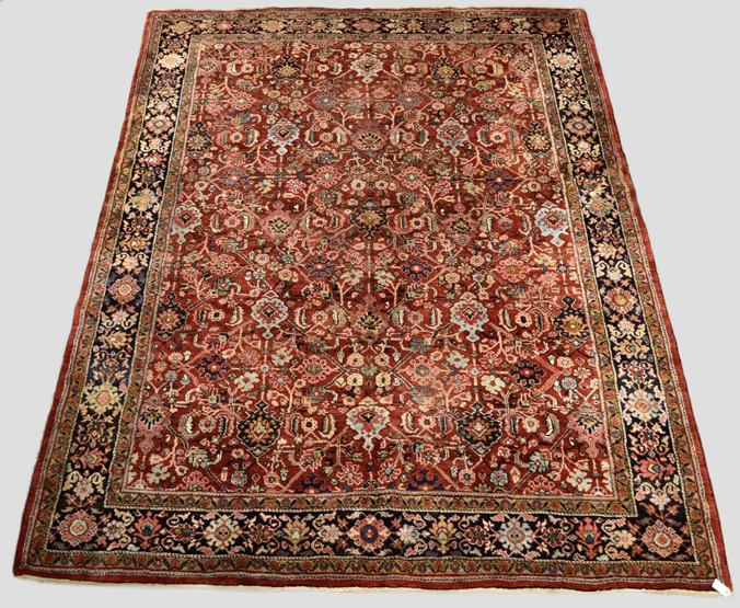 Mahal carpet, north west Persia, 1940-50s, 12ft. 1in. x 9ft. 2in. 3.68m. x 2.80m. Damage and hole