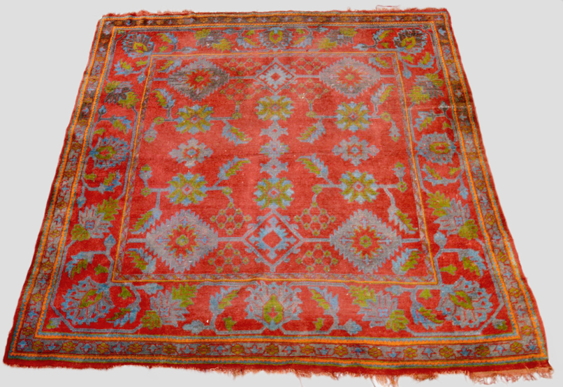 Ushak `Turkey` carpet, west Anatolia, early 20th century, 10ft. 5in. x 10ft. 3.17m. x 3.05m. Overall