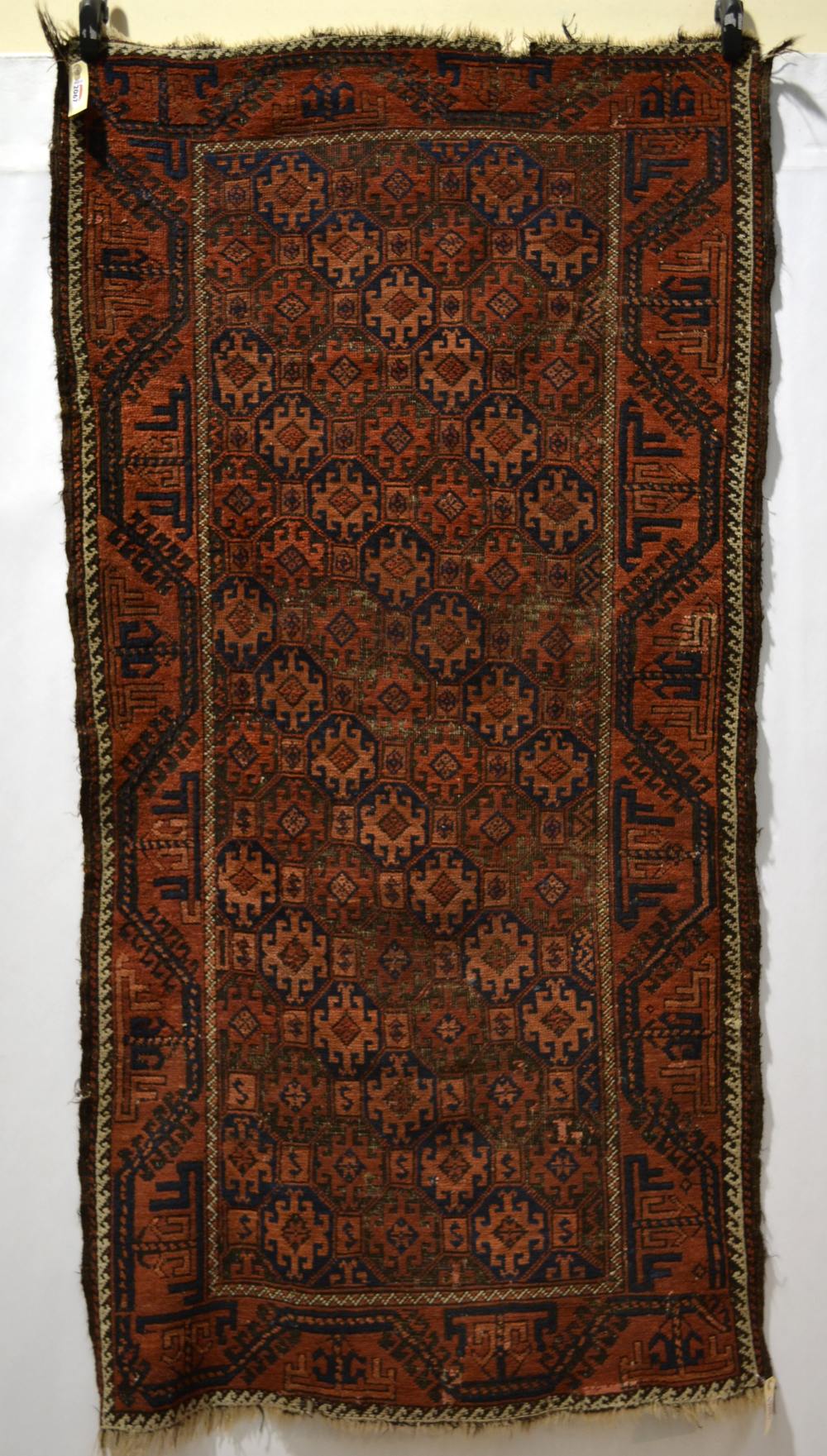 Baluchi rug, Mashad region, Khorasan, north east Persia, about 1930, 5ft. 11in. x 2ft. 11in. 1.