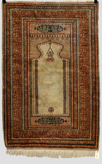 Anatolian `art silk` prayer rug, 20th century, 4ft. 4in. x 2ft. 10in. 1.32m. x 0.86m.