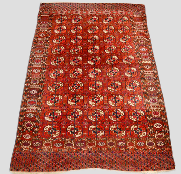 Tekke Turkmen main carpet, Turkmenistan, about 1930-40s, 9ft. 3in. x 5ft. 9in. 2.82m. x 1.75m.