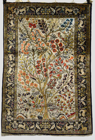 Silk Qum rug, south central Persia, 20th century, 5ft. 1in. x 3ft. 5in. 1.55m. x 1.04m.