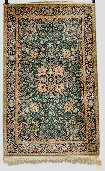 Fine silk rug, probably Nain, south west Persia, 20th century, 4ft. 2in. x 2ft. 7in. 1.27m. x 0.79m.