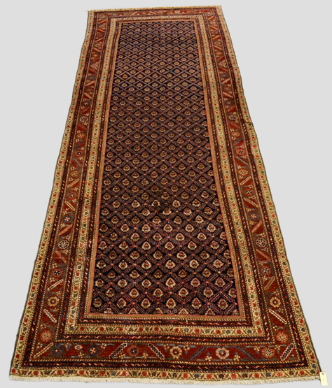 Hamadan kelleh, north west Persia, about 1950, 15ft. x 5ft. 3in. 4.57m. x 1.60m. Slight overall even