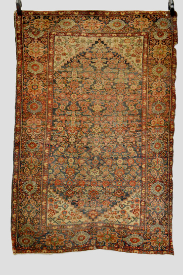 Feraghan rug, north west Persia, early 20th century, 4ft. 10in. x 3ft. 4in. 1.47m. x 1.02m.