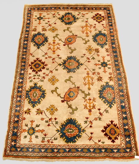 Attractive Ushak carpet, west Anatolia, about 1920-30 10ft. 11in. x 6ft. 8in. 3.33m. x 2.03m. Note