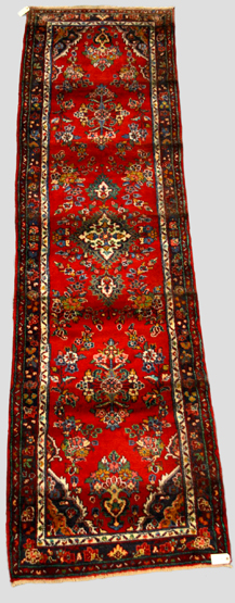 Hamadan runner, north west Persia, mid-20th century, 9ft. 11in. x 2ft. 9in. 3.02m. x 0.84m.