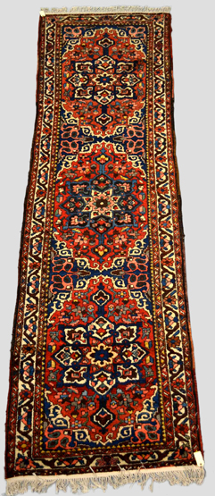 Bakhtiari runner, Chahar Mahal valley, south west Persia, mid 20th century, 11ft. x 3ft. 3in. 3.35m.