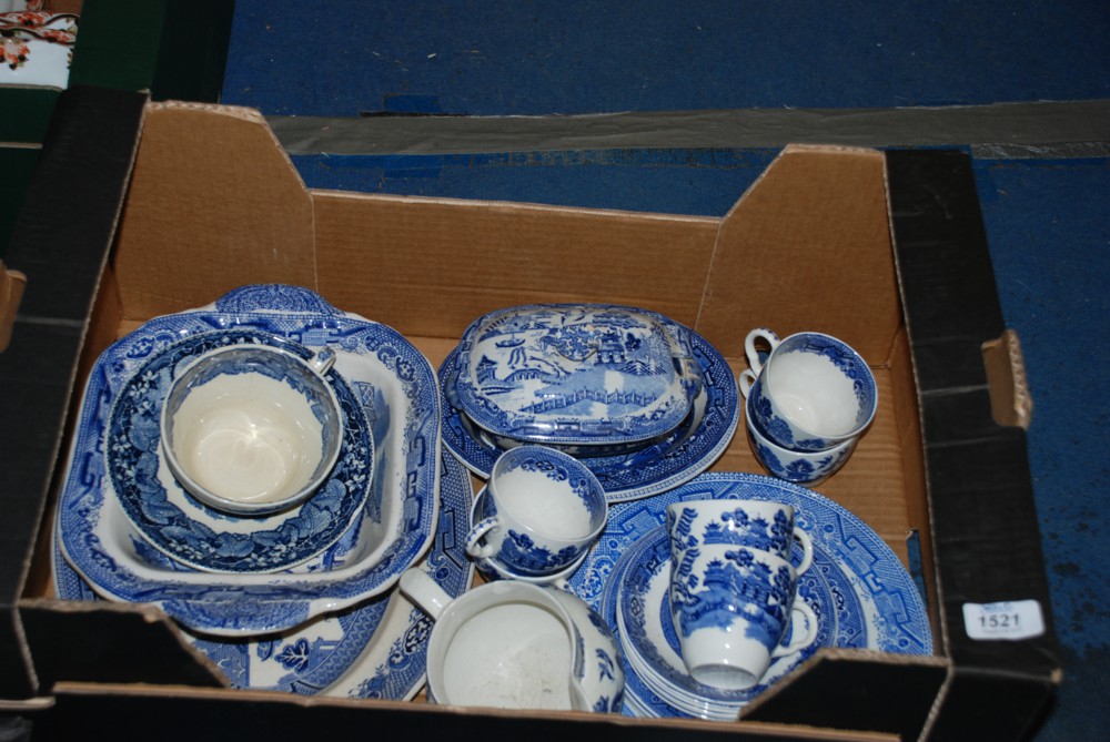 A quantity of miscellaneous Willow pattern china incl. sauce tureen, a/f, cups, saucers, jug,