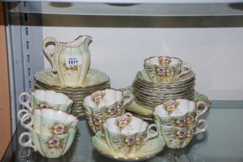 A Victorian Chapman part Teaset incl. ten Cups and eleven saucers, ten Tea Plates, two Cake Plates