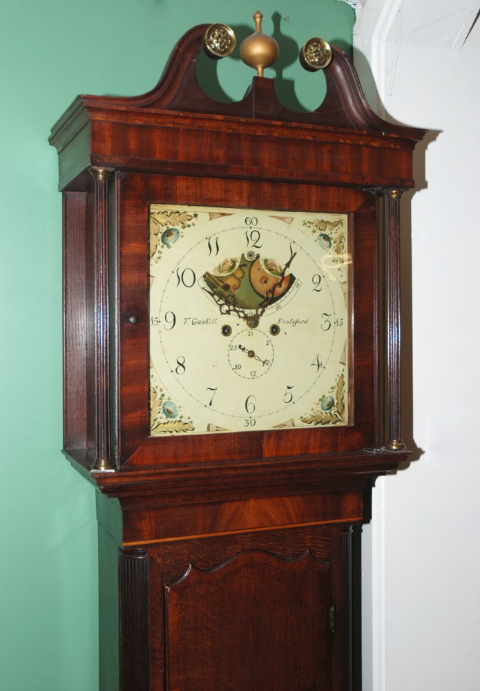 A fine old Oak and Mahogany cased eight day Longcase Clock having a painted 14'' square face with