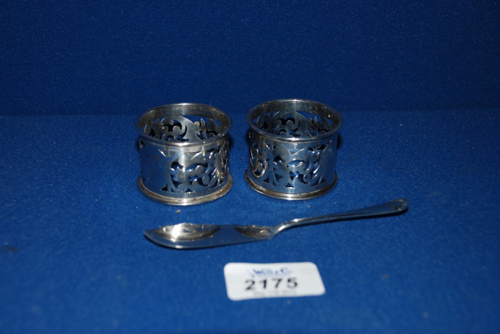 A Silver butter knife and two Silver Napkin Rings