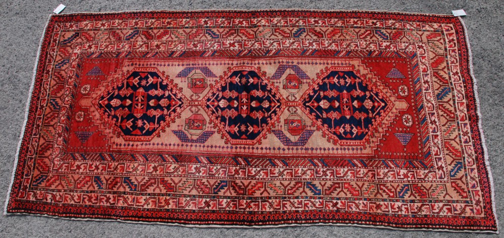 A Kazak Rug, South West Caucasus, circa 1920, the camel field having a column of three polychrome