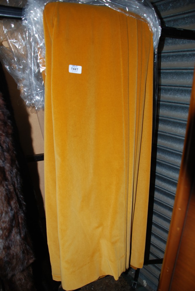 A pair of gold velvet Curtains, 90'' wide, 78'' drop.