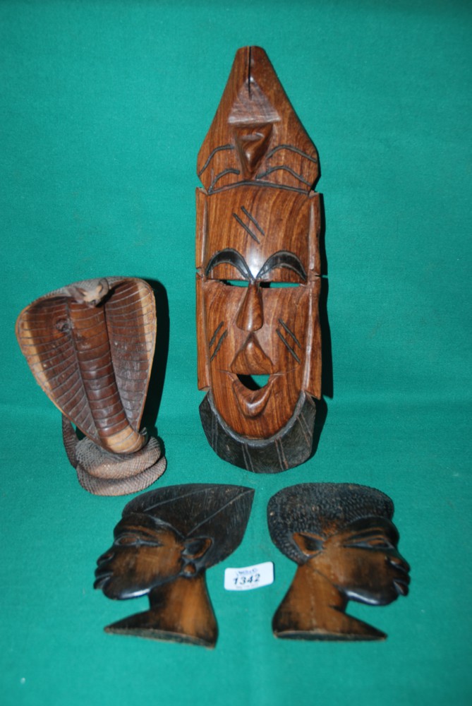 A pair of wooden Tribal Plaques, Tribal Mask and wooden Cobra ornament
