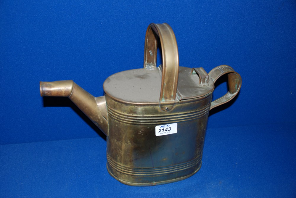 A brass Watering Can