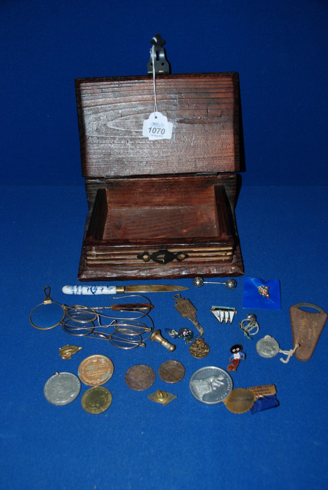 A wooden box containing Spectacles, Badges and commemorative items, etc.