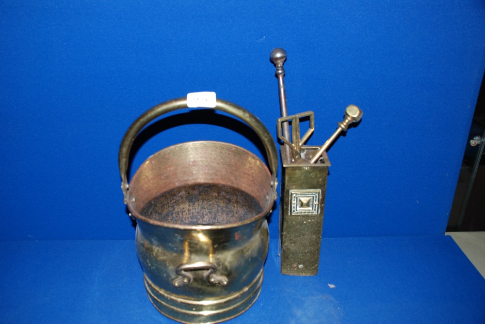 A Brass coal Bucket and set of fire irons.