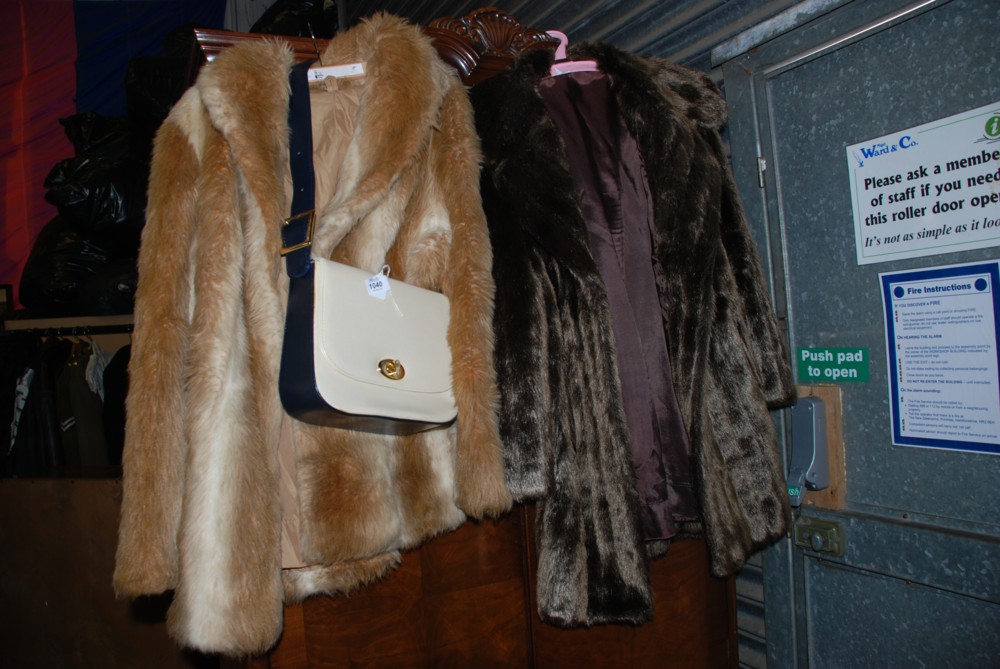 A three quarter length faux fur Coat, a short faux fur Jacket plus a vintage navy and cream Shoulder