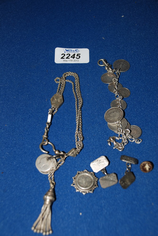 A Silver Coin Bracelet, a white metal Watch Chain and a pair of Silver Cufflinks.