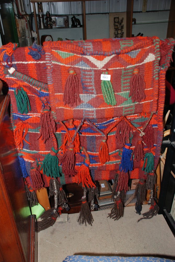 A large colourful woolen Camel Bag and Hanging