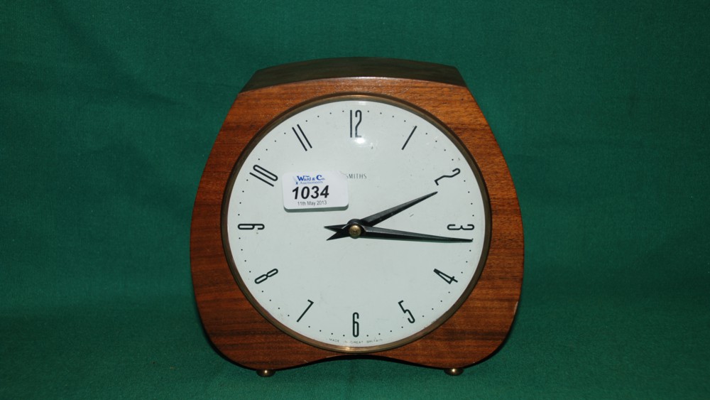 An Oak cased Smith's Mantle Clock with key.