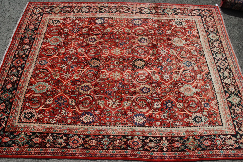 A Mahal 'Sultanabad' Carpet from West Persia about 1920, the madder field having an all over