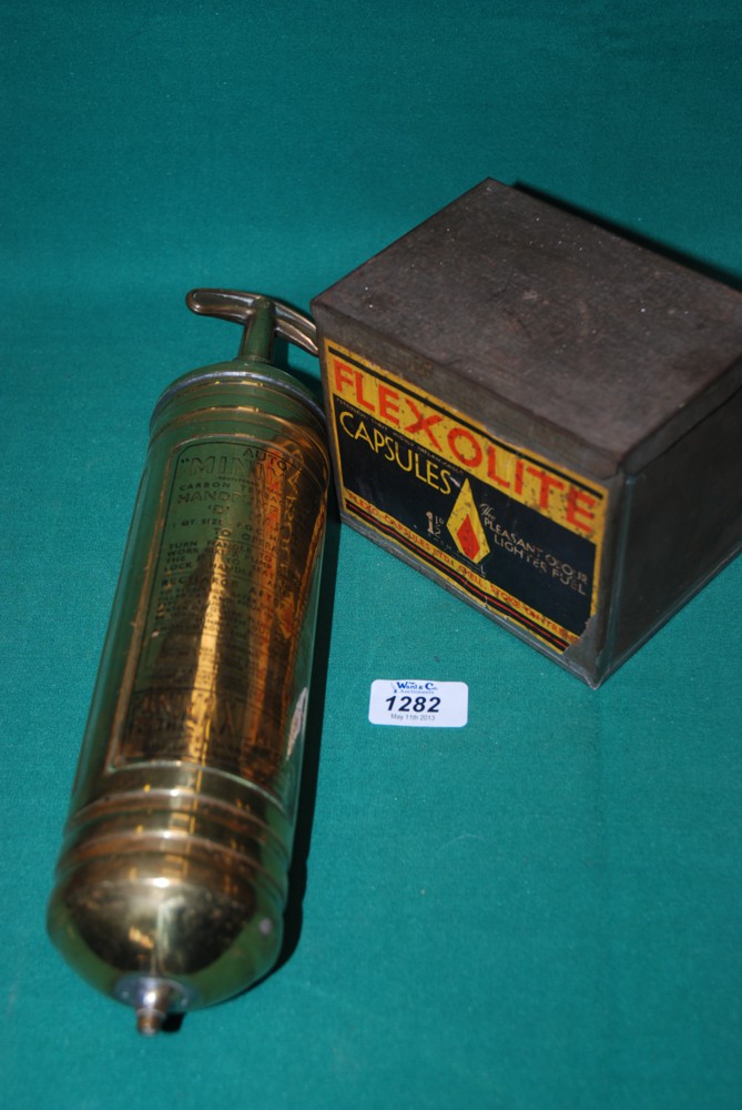 A 1967 Brass Fire Extinguisher for a car plus a Flexolite Tin with some contents