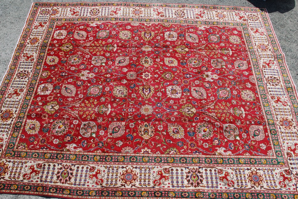 A good Tabriz Carpet from North West Persia, about 1920, the strawberry field having an all over