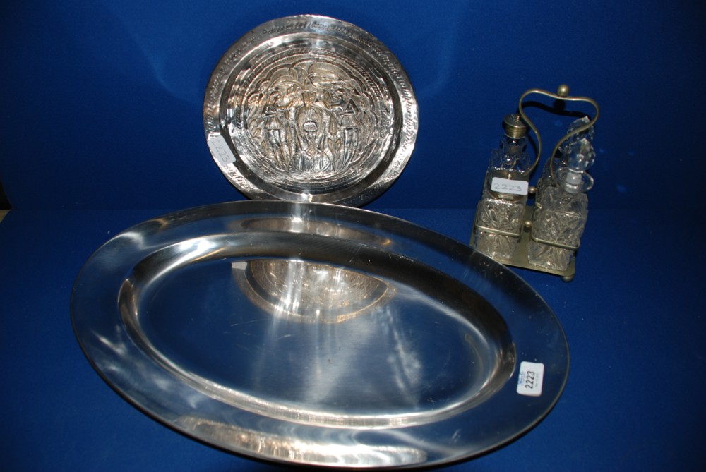 A stainless steel Fish Platter, Cruet and embossed Plate